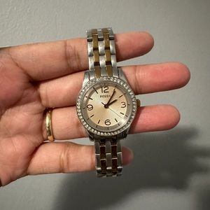Fossil , baby g, and Guess Watch for sale!!! This is used but looks new.